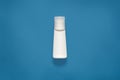 Mockup horizontal picture of white plastic bottle for liquids, cosmetic issues, situated in centre of photo, isolated over phantom Royalty Free Stock Photo
