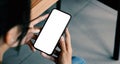 mockup image blank white screen for advertise. woman hand texting using mobile on desk at coffee shop