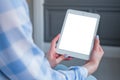 Mockup image of digital tablet computer with white blank screen in woman hands Royalty Free Stock Photo