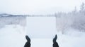 Mockup image of hands in sweater glove holding white blank paper in winter forest