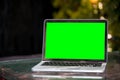 Mockup image of laptop with blank green screen