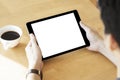 Mockup image of a man holding black color tablet device in hands Royalty Free Stock Photo