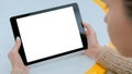 Woman holding black tablet with white blank screen - mockup image Royalty Free Stock Photo