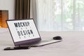 Mockup laptop on the bed. Relax and chill. Blank mock up screen notebook for blog, website, social media. Working in the bedroom Royalty Free Stock Photo