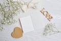 Mockup Letter with a calligraphic pen greeting card for St. Valentine`s Day in rustic style with place for your text, Flat lay, t Royalty Free Stock Photo