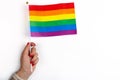 Mockup made with the LGBT pride flag with the heart coloured in LGBTQ pride colours. Concept of the Pride day, Valentine