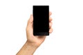 Mockup of male hand holding black cell phone Royalty Free Stock Photo