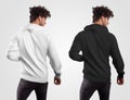 Mockup mens hoodie on a guy, back view, white and black sweatshirt, isolated on background