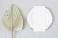 Mockup menu card with leaf palm on the plate