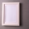 Mockup. Empty picture frame against pastel background. Royalty Free Stock Photo