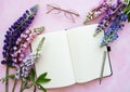 Mockup notebook with lupine flowers Royalty Free Stock Photo