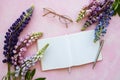 Mockup notebook with lupine flowers Royalty Free Stock Photo