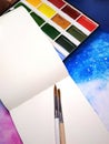 Mockup notebook paper watercolor paint palette paintbrush space photo