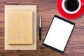 Mockup notebook with tablet, office desk top view. Royalty Free Stock Photo