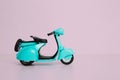 Mockup of Old retro toy motorcycle on pink background. Business empty mock-up background for text message Royalty Free Stock Photo