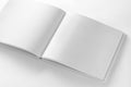 Mockup of opened blank square book at white design paper