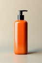 Mockup orange bottle with a dispenser for cosmetics on a light background