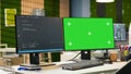 Mockup PC in empty IT startup office displaying programming languages Royalty Free Stock Photo