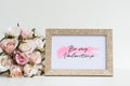 Mockup Picture frame and pink roses. Valentines Day Background concept with copy space. Mock up with photo frame and flowers with Royalty Free Stock Photo