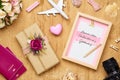 Mockup picture frame for travel with valentines day & love season background concept. Top view of mock up photo frame with craft Royalty Free Stock Photo