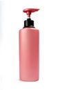 Mockup pink bottle for design. Pink container for cosmetics isolated on a white background. Beauty and health concept