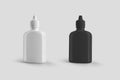 Mockup of a plastic white, black bottle with a screw cap, a jar with a pipette, isolated on background Royalty Free Stock Photo