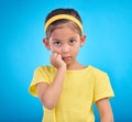 Mockup, portrait and girl with fear, afraid and mental health issue on blue studio background. Face, female kid and