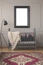 Mockup of poster above bed with blanket in kid`s bedroom interior with lamp and carpet. Real photo Royalty Free Stock Photo