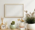 Mockup poster frame close up in cozy white interior background Royalty Free Stock Photo