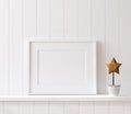 Mockup poster frame close up on shelf with toy Royalty Free Stock Photo