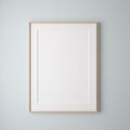 Mockup poster frame close up on wall painted pastel blue color