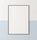 Mockup poster frame close up on wall painted white and pastel blue color