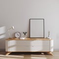 Mockup poster frame in modern scandinavian style interior on minimalistic chest of drawers with decor. Poster or picture frame