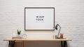 mockup poster on a white brick wall. The poster above the desk and shelves in a hipster style. 3D render