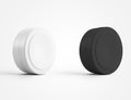 Mockup of round packaging for skin care product, white, black jar, isolated on background Royalty Free Stock Photo