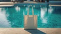 Mockup shopper beach tote bag handbag near swimming pool background. Copy space shopping eco reusable bag. Grocery accessories.