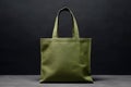 Mockup shopper green khaki color tote bag handbag on isolated black background. Copy space shopping eco reusable bag. Grocery