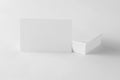 Mockup of single white business card at cards stack Royalty Free Stock Photo