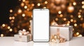 Mockup smartphone with blank screen and christmas gifts on bokeh background Royalty Free Stock Photo