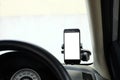 Mockup Smartphone in a car use for Navigate or GPS. Smartphone i