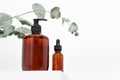 Mockup Spa body cosmetics in brown glass bottles serum with a pipette, oil, gel, shower soap shampoo