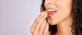 Mockup, strawberry and mouth with a black woman eating in studio on a gray background to promote health. Food, fruit and Royalty Free Stock Photo