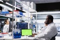 Mockup tablet app used by laboratory technician for DNA data analysis Royalty Free Stock Photo