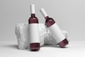 Mockup template with two wine bottles next to decorative white stones