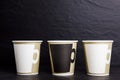 mockup three coffee go cups. High quality photo