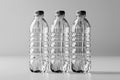 mockup of three transparent plastic bottles for water on a white isolated background. Blank template for packaging Royalty Free Stock Photo