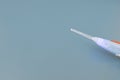 Mockup Top View Ear Wax Removal Glass Stick Or Curette on Blue Background, Copy Space For