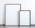 Mockup of two blank frame posters on the floor Royalty Free Stock Photo