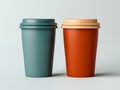 mockup of two paper coffee cups with striped lids