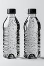 mockup of two transparent full plastic bottles for mineral water on white isolated background. Blank template for Royalty Free Stock Photo
